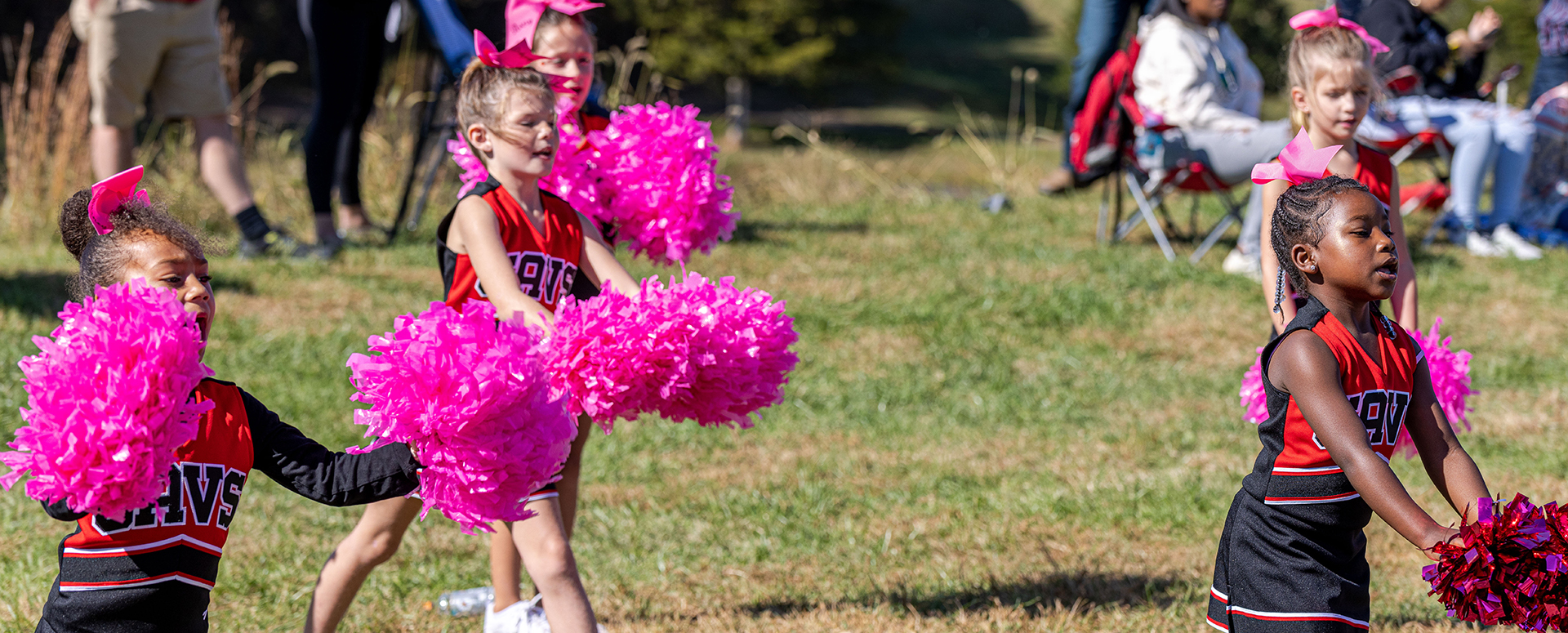 Girls cheer at Bedford County Parks and Rec football game