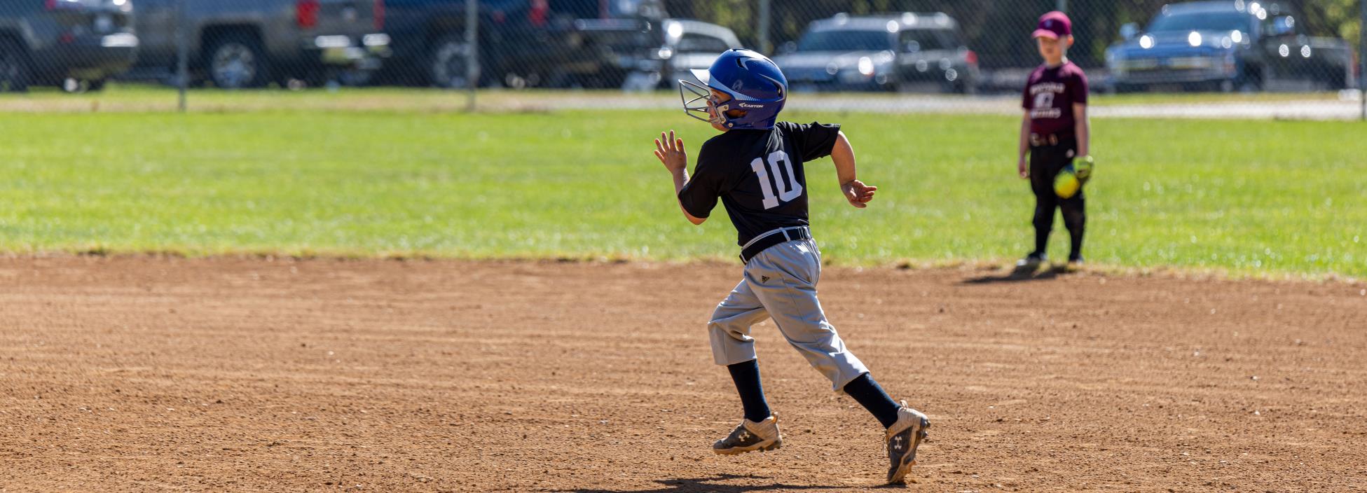 Boy runs the bases at Bedford County game.